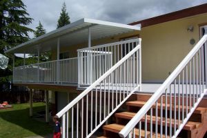 Aluminum Patio Cover with Aluminum Picket Deck and Stair Railing - Castle Decks