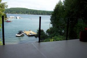 Glass Railing System with Vinyl Deck Covering