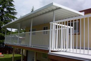 Aluminum Patio Cover, with Vinyl Decking and Aluminum Picket Railings| Castle Decks & Aluminum Products