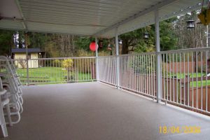 Aluminum Patio Cover, with Vinyl Decking and Aluminum Picket Railings| Castle Decks & Aluminum Products